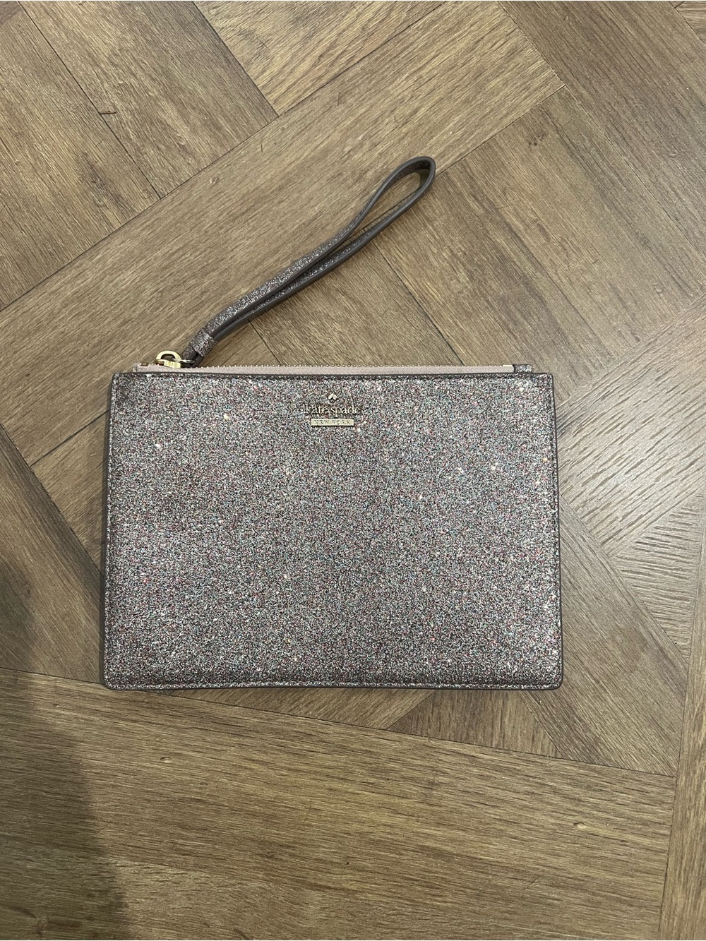 kate spade glitter wristlet in rose gold multi-tone